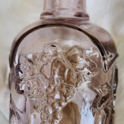 Rose Tinted Embossed Fruit Pattern Glass Bottle With Cork